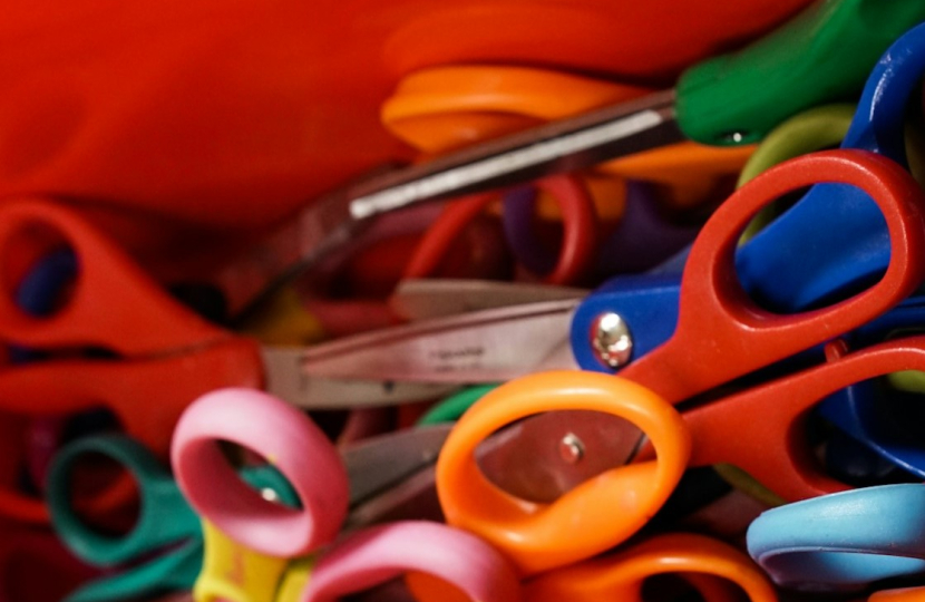 Box of scissors depicting child protection