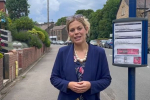 Miriam waiting by a Stocksbridge bus stop