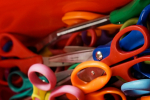 Box of scissors depicting child protection