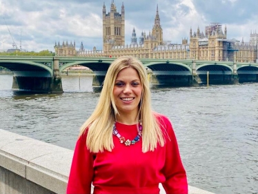 Miriam Cates MP with a Parliament backdrop